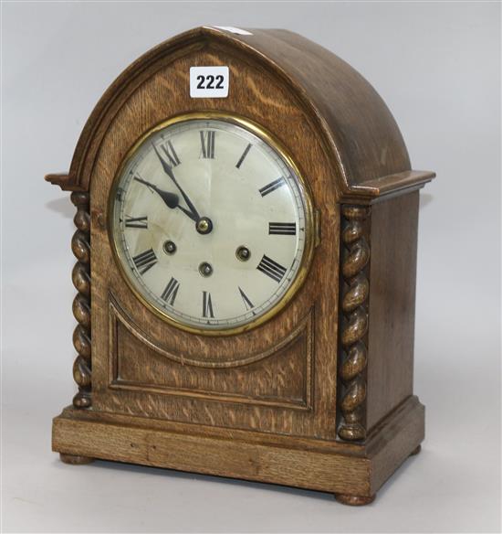 An Edwardian oak eight day striking and chiming mantel clock, in lancet case height 33cm
